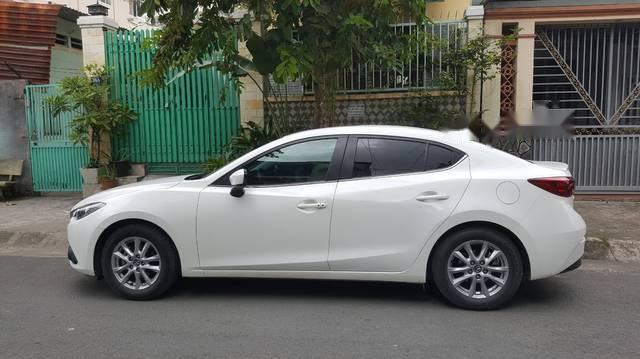 Mazda 3 1.5 AT 2016 - Cần bán lại xe Mazda 3 1.5 AT đời 2016, màu trắng còn mới 