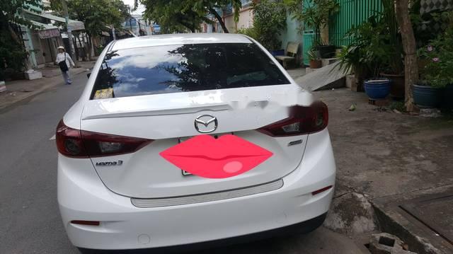 Mazda 3 1.5 AT 2016 - Cần bán lại xe Mazda 3 1.5 AT đời 2016, màu trắng còn mới 