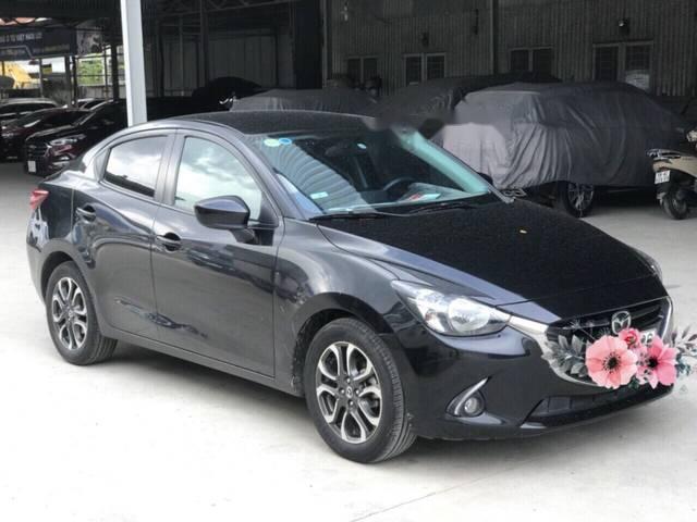 Mazda 2 1.5 AT 2016 - Cần bán lại xe Mazda 2 1.5 AT năm sản xuất 2016, màu đen số tự động, giá tốt