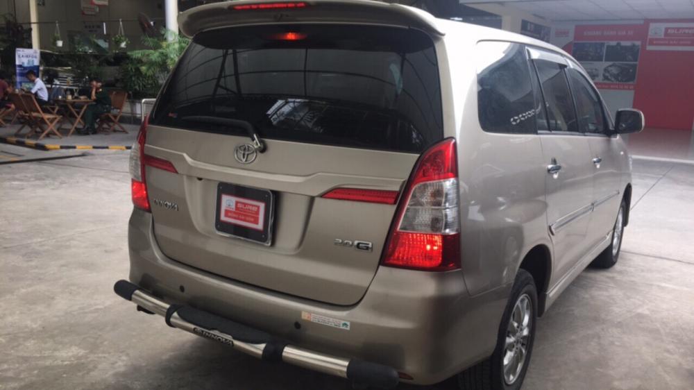 Toyota Innova G AT 2014 - Bán xe Toyota Innova G AT đời 2014, màu nâu quá mới.