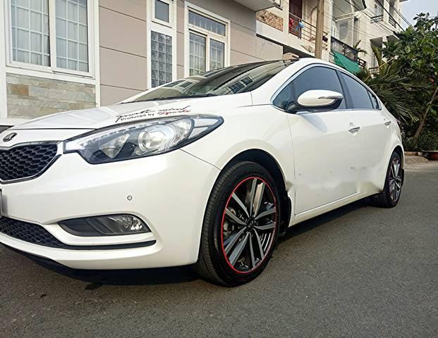 Kia K3 2.0 2015 - Bán Kia K3 2.0 đời 2015, màu trắng, 565 triệu