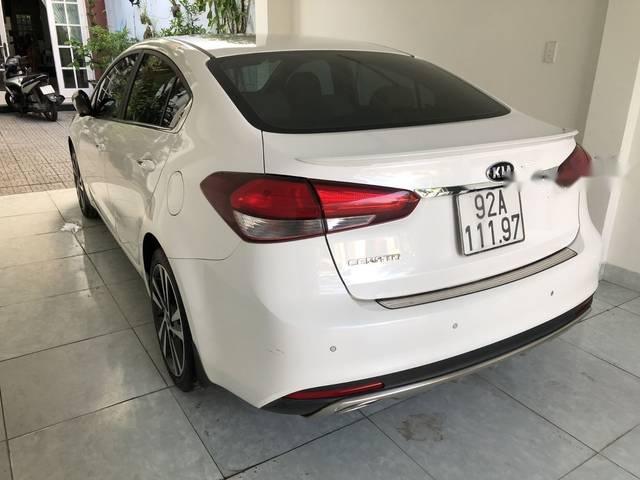 Kia Cerato  1.6AT 2018 - Cần bán lại xe Kia Cerato 1.6AT năm 2018, màu trắng xe gia đình