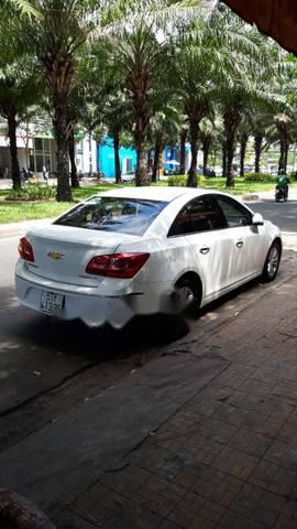 Chevrolet Cruze  LT 2016 - Cần bán lại xe Chevrolet Cruze LT đời 2016, màu trắng số sàn, giá 419tr