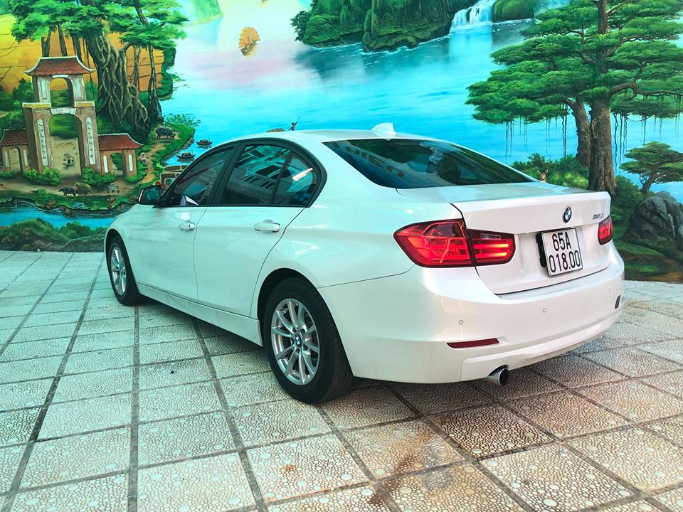 BMW 3 Series 320i 2012 - Bán xe BMW 320i màu trắng camay 2013 - 839 triệu