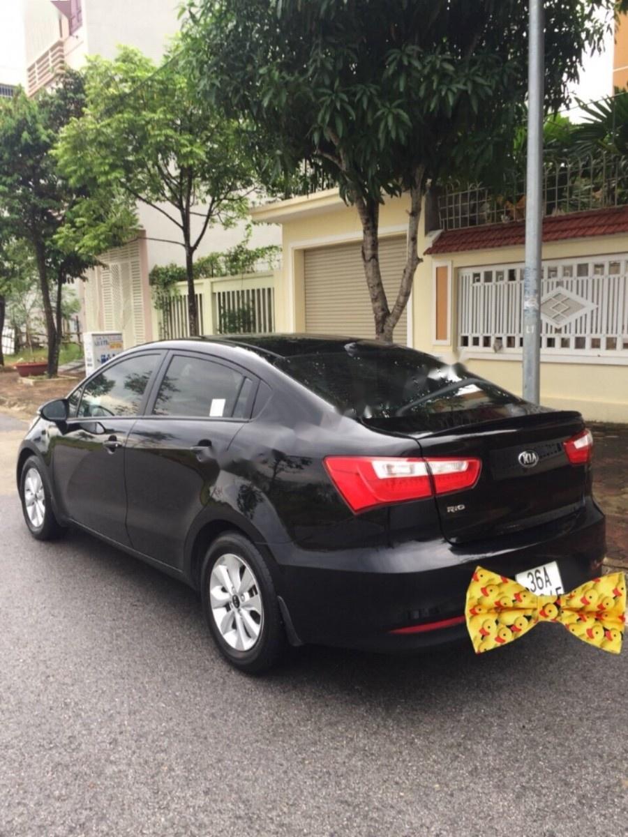 Kia Rio 1.4 AT 2016 - Cần bán xe Kia Rio 1.4 AT sản xuất 2016, màu đen, nhập khẩu  