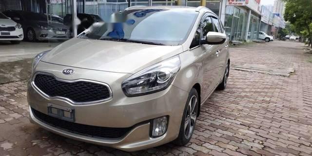 Kia Rondo AT 2015 - Cần bán Kia Rondo AT sản xuất năm 2015, màu vàng, 620tr