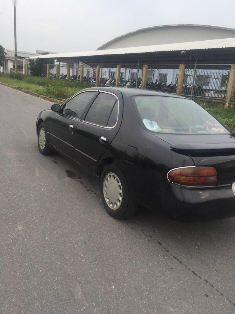 Nissan Altima 2.4 MT 1993 - Cần bán lại xe Nissan Altima 2.4 MT năm sản xuất 1993, màu xám 