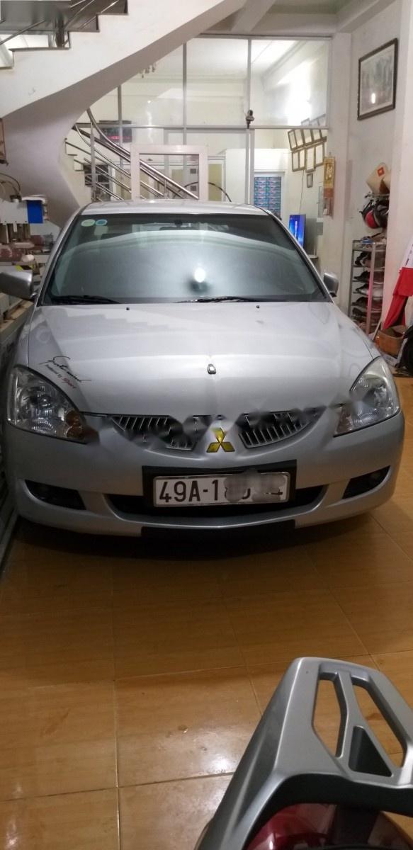 Mitsubishi Lancer 2004 - Bán Mitsubishi Lancer 2004, màu bạc số tự động, giá 250tr