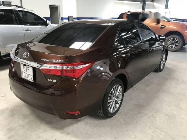 Toyota Corolla altis 2015 - Bán ô tô Toyota Corolla altis năm sản xuất 2015, màu nâu như mới