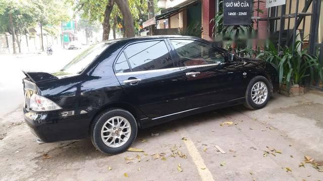 Mitsubishi Galant 2003 - Bán ô tô Mitsubishi Galant sản xuất 2003, màu đen số tự động