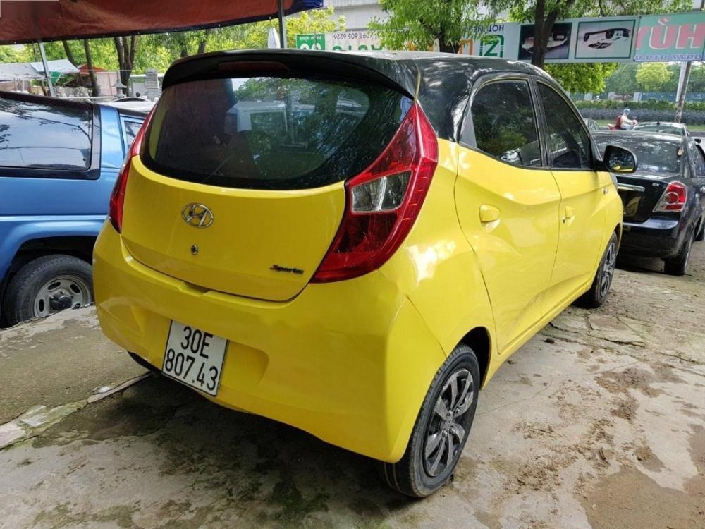 Hyundai Eon 0.8 MT 2013 - Cần bán gấp Hyundai Eon 0.8 MT đời 2013, màu vàng, nhập khẩu nguyên chiếc chính chủ