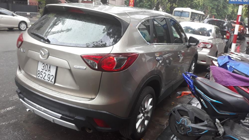 Mazda CX 5 2015 - Chính chủ cần bán Mazda CX5 2015 màu vàng cát