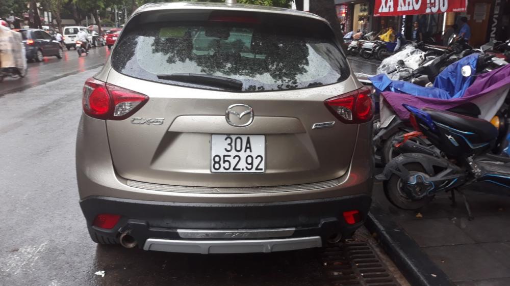 Mazda CX 5 2015 - Chính chủ cần bán Mazda CX5 2015 màu vàng cát