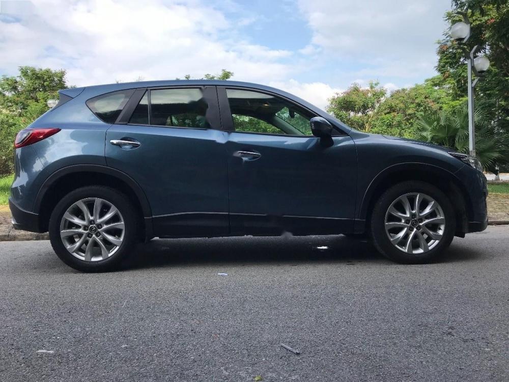 Mazda CX 5 2.0AT 2015 - Bán Mazda CX 5 2015, màu xanh lam, một chủ mua từ mới, bản 2.0 số tự động