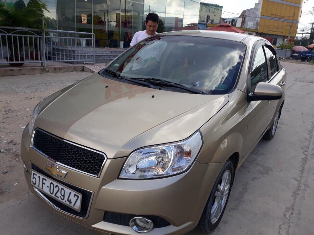 Chevrolet Aveo  LTZ 1.5AT 2014 - Bán ô tô Chevrolet Aveo 2014, màu vàng , 326tr