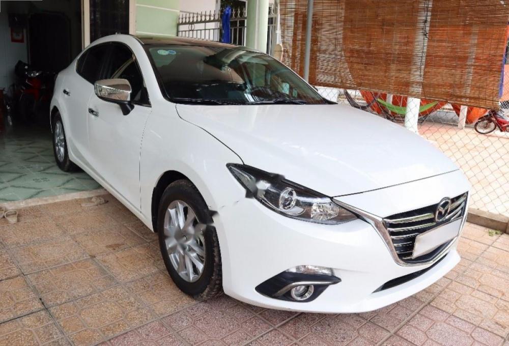 Mazda 3 1.5 AT 2016 - Bán Mazda 3 1.5AT sản xuất năm 2016, màu trắng, lắp ráp trong nước Việt Nam