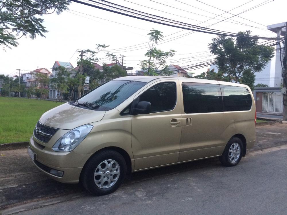 Hyundai Starex 2010 - Bán ô tô Hyundai Starex 9 chỗ đời 2010, màu vàng, xe nhập 