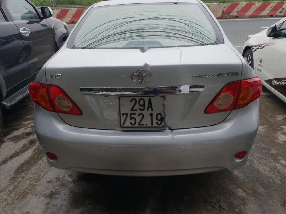 Toyota Corolla altis 1.8E AT 2009 - Cần bán gấp Toyota Corolla altis 1.8E AT 2009, màu bạc, xe nhập  