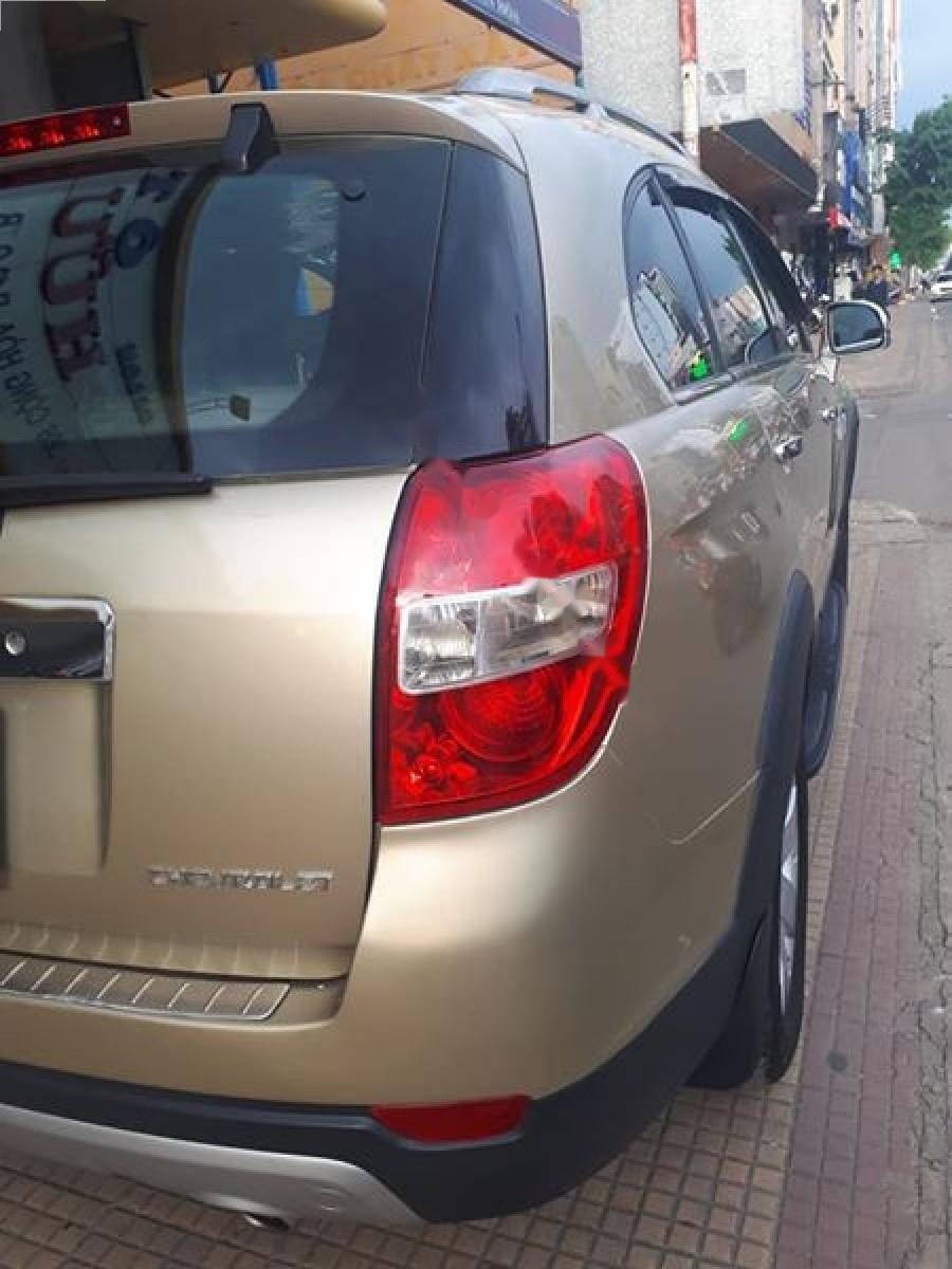 Chevrolet Captiva LT 2.4 MT 2007 - Bán xe cũ Chevrolet Captiva LT 2.4 MT đời 2007, màu vàng