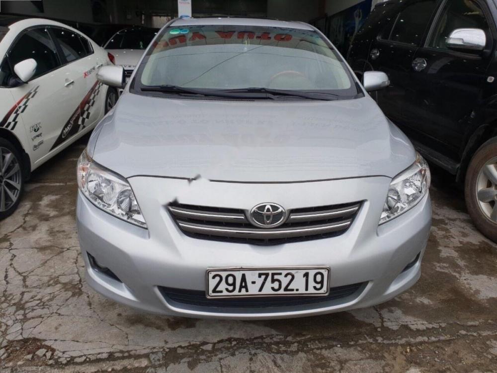 Toyota Corolla altis 1.8E AT 2009 - Cần bán gấp Toyota Corolla altis 1.8E AT 2009, màu bạc, xe nhập  