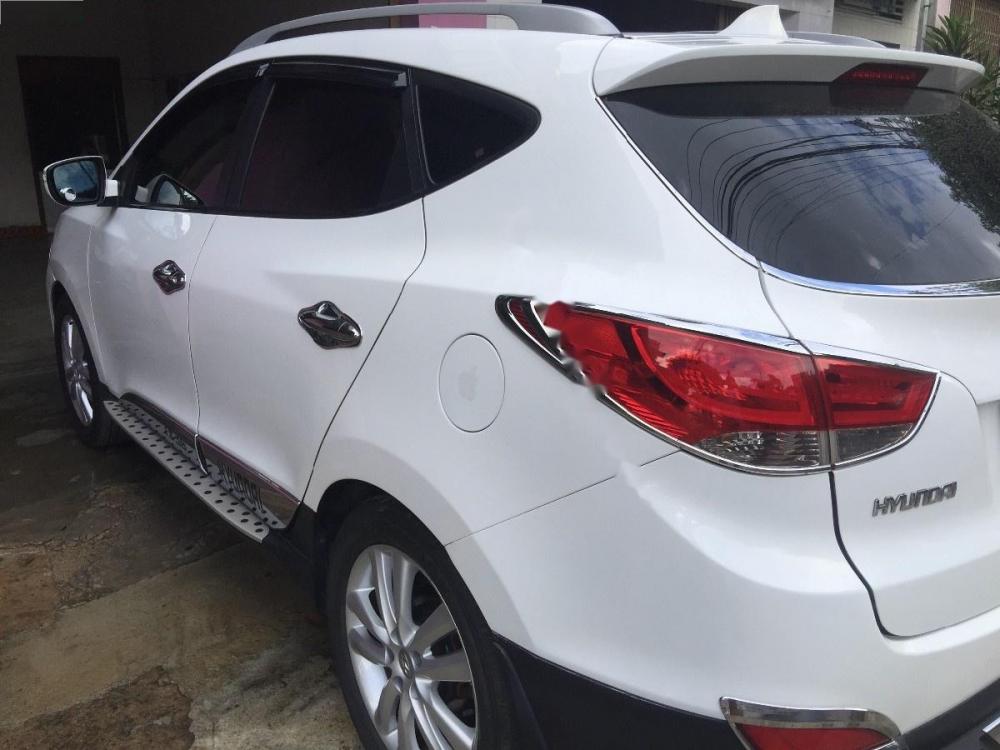 Hyundai Tucson 2010 - Cần bán xe Hyundai Tucson đời 2010, màu trắng, nhập khẩu  