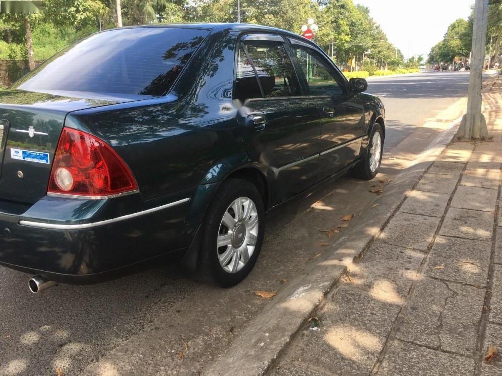 Ford Laser 1.8 Ghia 2003 - Cần bán xe Ford Laser 1.8 Ghia sản xuất năm 2003, màu xanh lam 