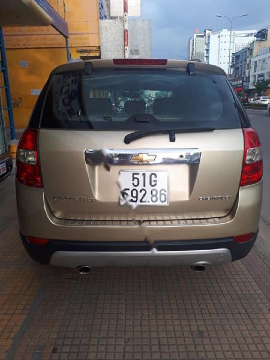 Chevrolet Captiva LT 2.4 MT 2007 - Bán xe cũ Chevrolet Captiva LT 2.4 MT đời 2007, màu vàng