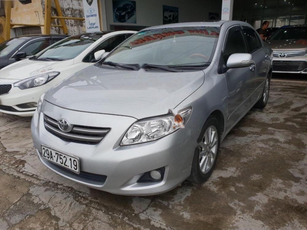 Toyota Corolla altis 1.8E AT 2009 - Cần bán gấp Toyota Corolla altis 1.8E AT 2009, màu bạc, xe nhập  