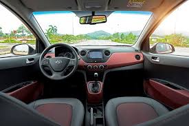 Hyundai Grand i10 1.2 2018 - Bán xe Hyundai Grand i10 1.2. AT SX 2018 trắng