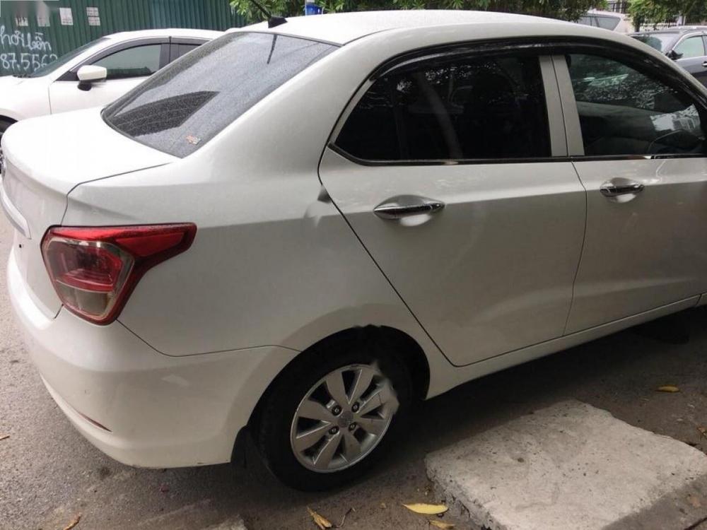 Hyundai Grand i10   1.2 MT 2016 - Cần bán gấp Hyundai Grand i10 1.2 MT đời 2016, màu trắng, xe nhập  