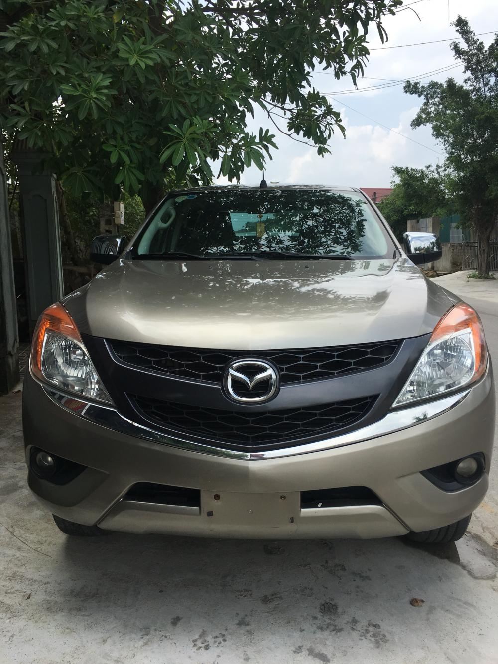 Mazda BT 50 2014 - Bán ô tô Mazda BT 50 sản xuất 2014 màu vàng nâu, nhập khẩu nguyên chiếc