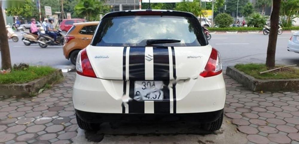 Suzuki Swift 1.4 AT 2015 - Cần bán gấp Suzuki Swift 1.4 AT đời 2015, màu trắng 