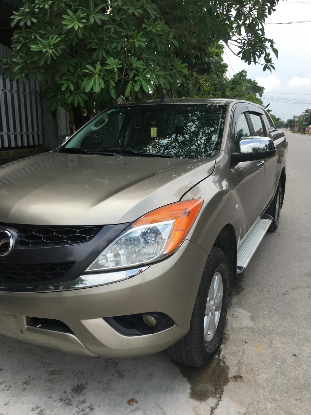 Mazda BT 50 2014 - Bán ô tô Mazda BT 50 sản xuất 2014 màu vàng nâu, nhập khẩu nguyên chiếc