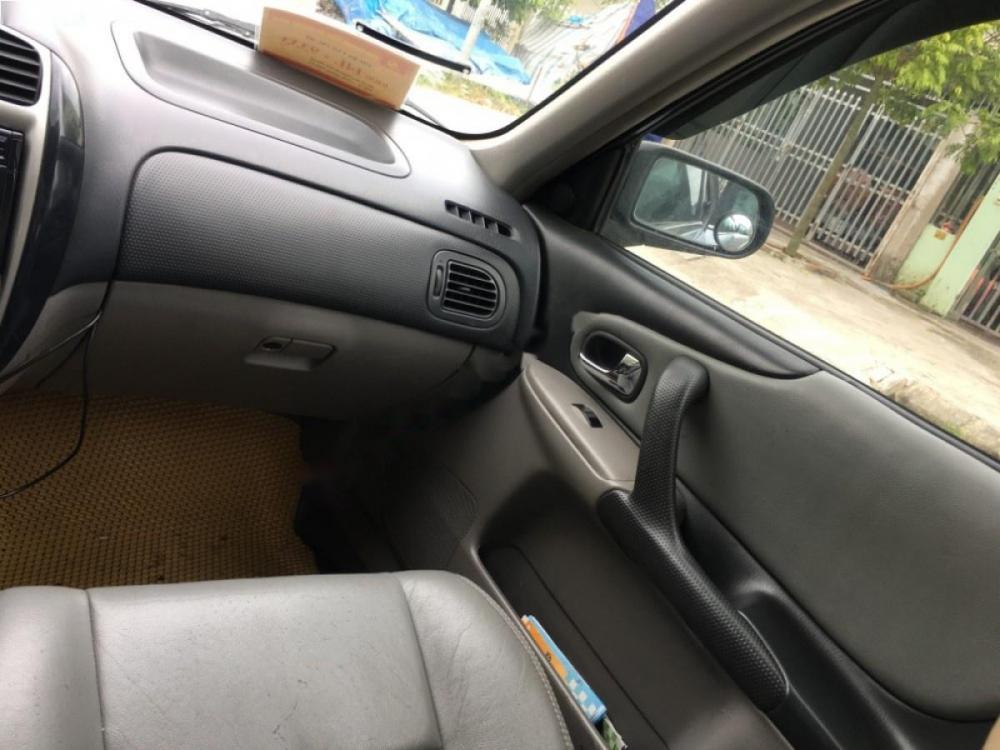 Ford Laser Ghia 1.8MT 2003 - Cần bán xe Ford Laser 1.8MT Ghia full-option (2003), xe công chức đang chay ngon