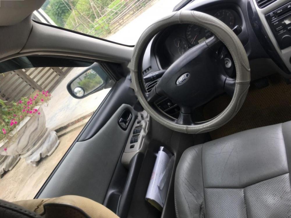 Ford Laser Ghia 1.8MT 2003 - Cần bán xe Ford Laser 1.8MT Ghia full-option (2003), xe công chức đang chay ngon