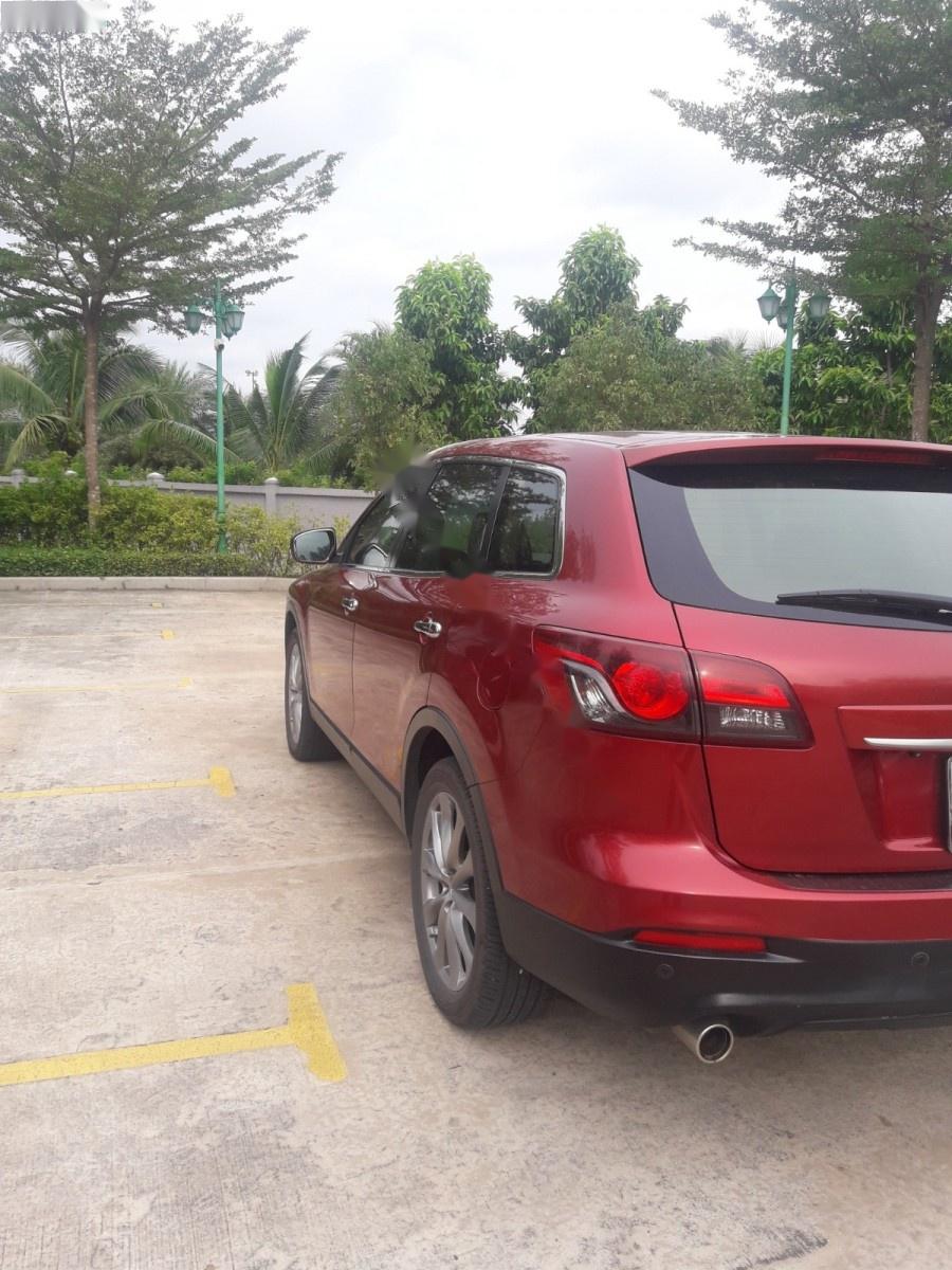 Mazda CX 9 3.7 AT AWD 2014 - Bán xe Mazda CX9 màu đỏ đô, đời 2014, máy 3.7L, số tự động đi được 70.000km