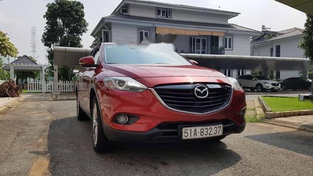 Mazda CX 9 2014 - Cần bán gấp Mazda CX 9 sản xuất 2014, màu đỏ xe gia đình