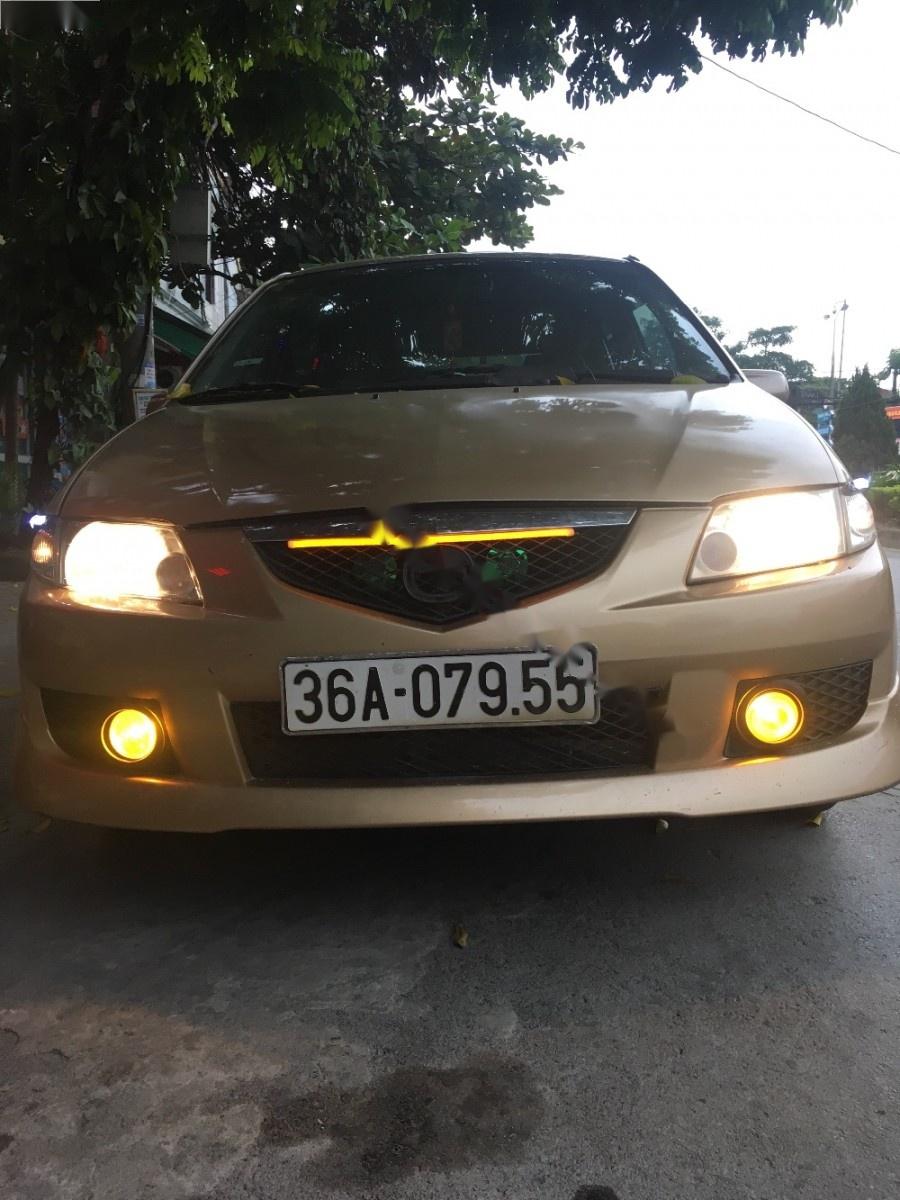 Mazda Premacy 1.8 AT 2003 - Cần bán xe Mazda Premacy 1.8 AT 2003, màu vàng