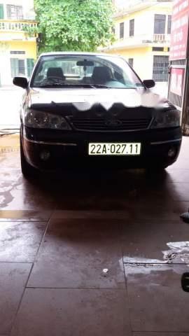 Ford Laser 2005 - Bán ô tô Ford Laser năm 2005, màu đen chính chủ