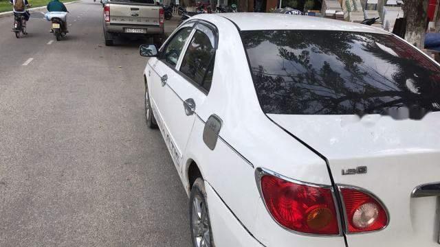 Toyota Corolla altis 2002 - Cần bán xe Toyota Corolla Altis 2002, màu trắng xe gia đình