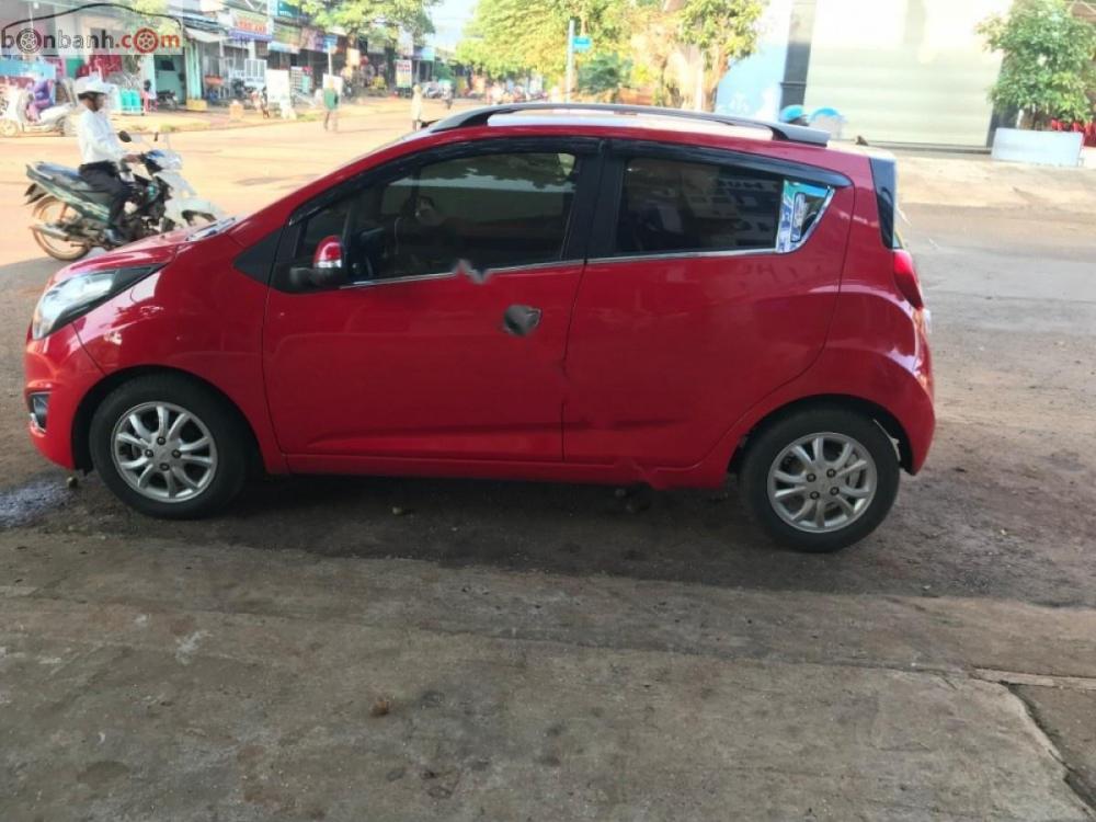 Chevrolet Spark LTZ 2014 - Xe cũ Chevrolet Spark LTZ năm 2014, màu đỏ còn mới