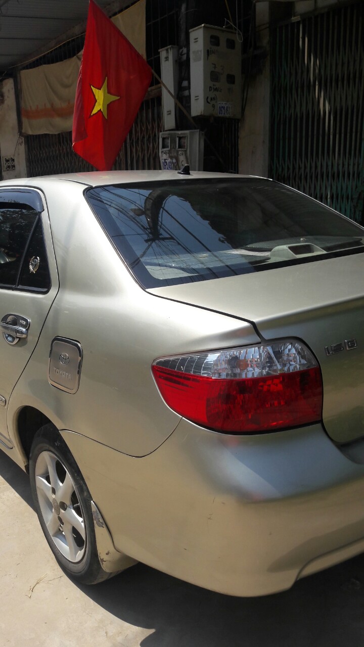 Toyota Vios E 2003 - Cần bán Toyota Vios E 2003, màu vàng chính chủ