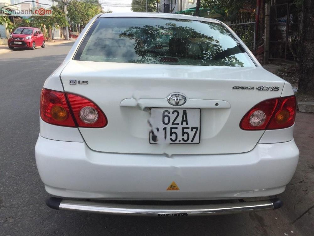 Toyota Corolla altis 1.8G MT 2002 - Bán ô tô Toyota Corolla altis 1.8G MT sản xuất 2002, màu trắng xe gia đình