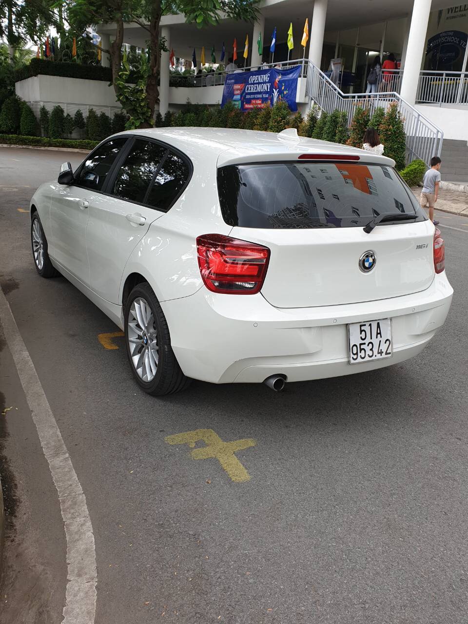 BMW 1 Series 116i 2014 - Bán xe BMW 116i Sx 2014, màu trắng, xe như mới