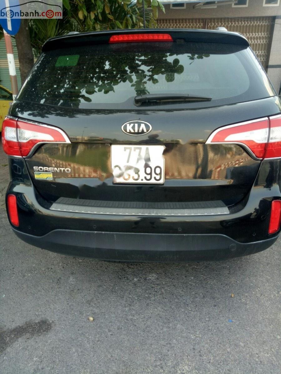 Kia Sorento GAT 2016 - Bán xe Kia Sorento GAT năm 2016, màu đen xe gia đình 
