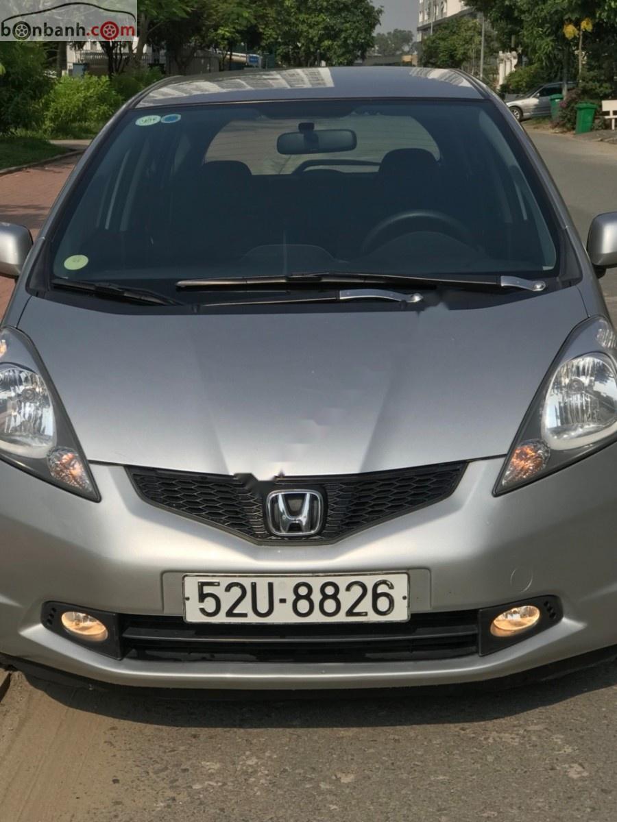 Honda FIT 1.5 AT 2009 - Cần bán lại xe Honda FIT 1.5 AT sản xuất 2009, màu bạc chính chủ, giá tốt