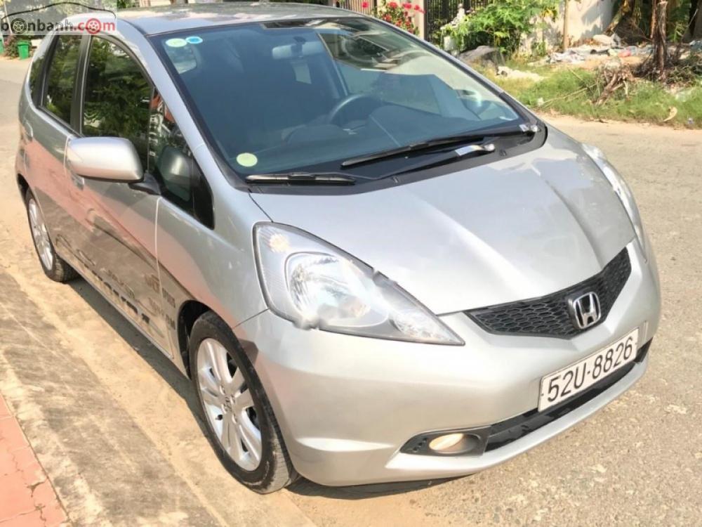 Honda FIT 1.5 AT 2009 - Cần bán lại xe Honda FIT 1.5 AT sản xuất 2009, màu bạc chính chủ, giá tốt