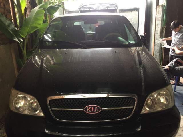 Kia Carnival  MT 2006 - Bán Kia Carnival MT sản xuất năm 2006, màu đen, xe đẹp