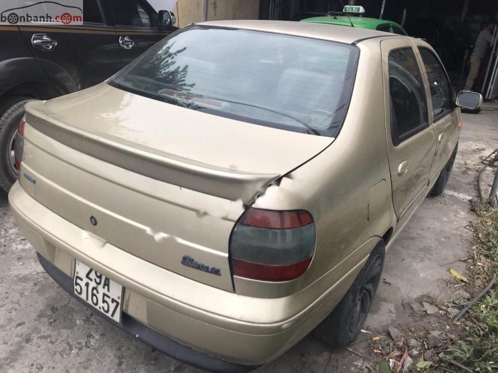 Fiat Siena 2002 - Cần bán Fiat Siena đời 2002, màu vàng