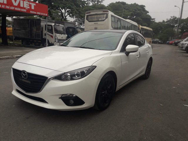 Mazda 3 1.5AT 2016 - Cần bán gấp Mazda 3 1.5AT đời 2016, màu trắng, giá chỉ 626 triệu